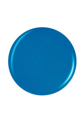 Deep neon blue color nail lacquer sample color drop in round shape isolated in white setting